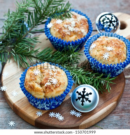 Muffins with  Blue Snowflakes Cup with Christmas Tree and Bells. Also available in vertical format.