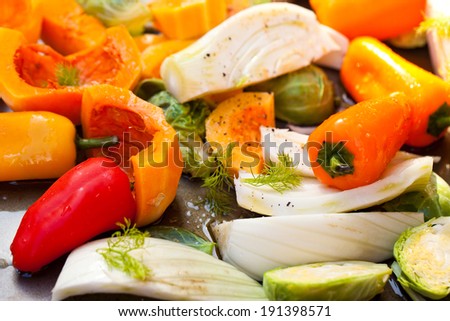 Vegetables, prepared for baking on a baking sheet. Also available in vertical format.