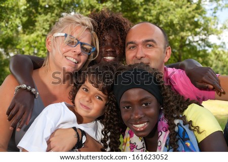 Happy Multicultural Family Having A Nice Summer Day