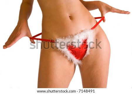 stock photo Close up of womans christmas panties about to drop