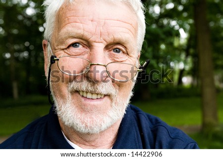 outside portrait of an elderly man laughing