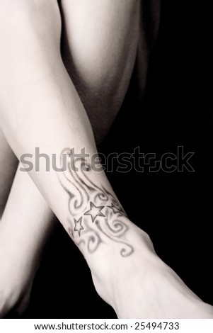 stock photo : Woman with different tattoos designed by herself