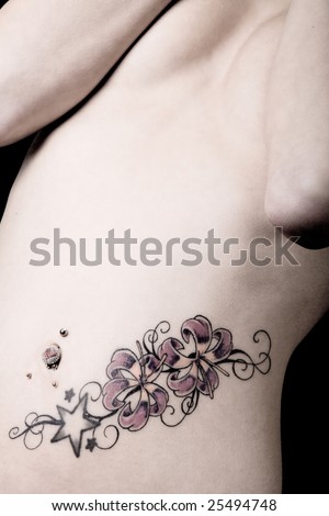 stock photo : Woman with different tattoos designed by herself