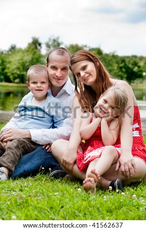 Happy family having a nice vacation in the park