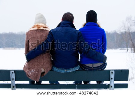 trio enjoying a wintery day in the park