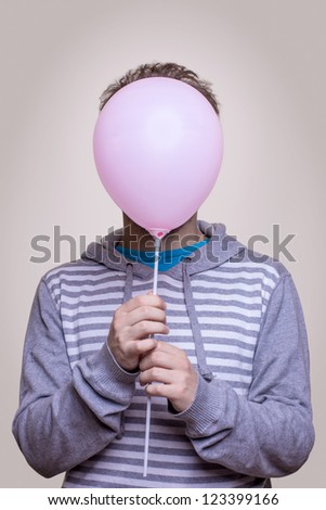 Portrait of guy with head - balloon