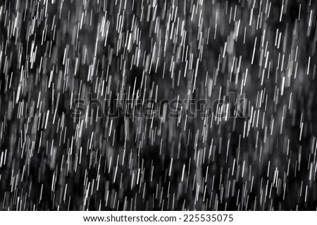 Rain on black. Abstract background.
