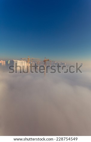 Foggy urban scene Thick fog in the morning covering a residential district. Kiev. Ukraine.