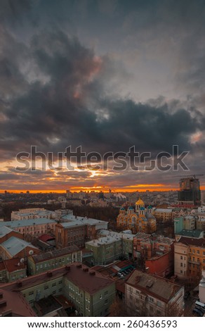 Stormy sunset sky over Kiev city. Downtown district. Ukraine.