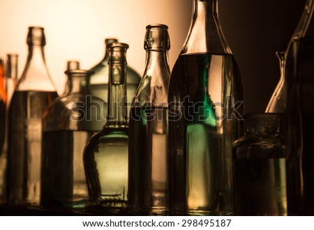 Still Life of Bottles in the homemade distillery cellar.