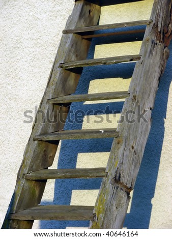wooden ladder with shadows