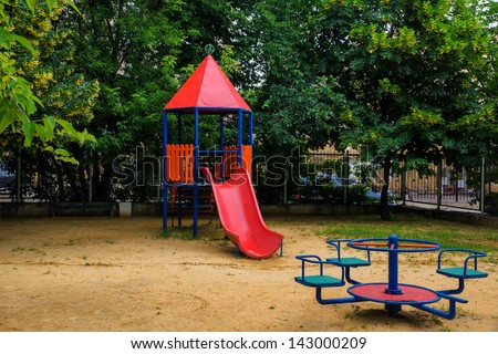 Children playground in the yard in summer