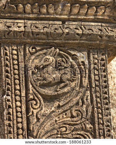 ancient bas-relief with mythical creature on the facade of ancient temple in Bagan(Pagan), Myanmar(Burma)