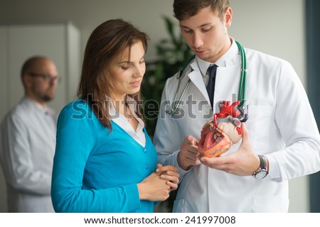 doctor consult patient with heart problems