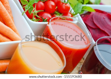 Tomato juice, carrot juice and beet juice
