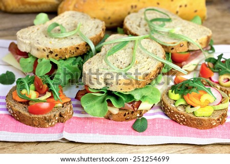 Vegetarian sandwich and ham sandwich