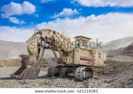 track-type loader excavator machine  at the opencast mining