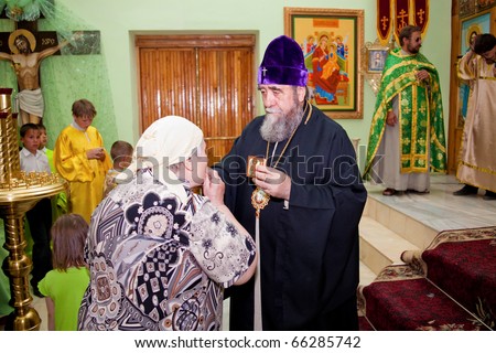 ZARAFSHAN, UZBEKISTAN - JUNE 5: Metropolitan of Tashkent and Central Asia Vladimir (R) during a pastoral visit to the Zarafshan.  June 5, 2010 in Zarafshan, Uzbekistan