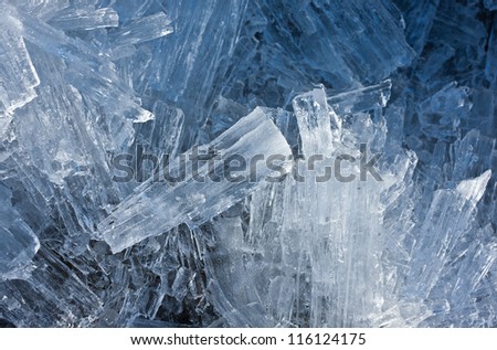 sharp blue crystals of ice close up