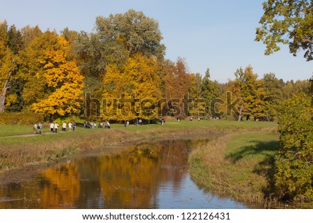 people walking in the autumn park, Pavlovsk, Russia