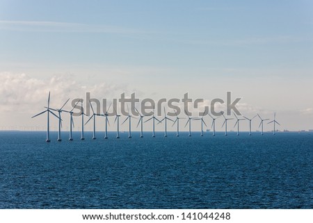 Wind power station on the sea near to coast of Denmark