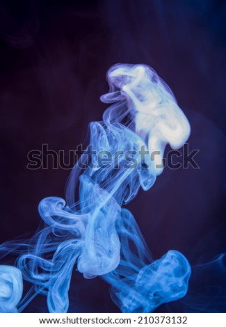 abstract background of smoke in two colors on a black background