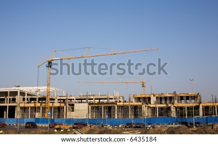 new city residential quarter building by the cranes