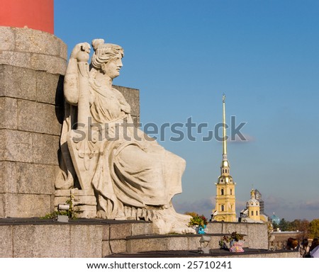 Sitting marble figure on base of Rostral column. Saint-Petersburg