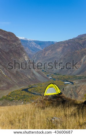 Tourist tent on a rock at precipice