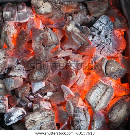 Burning coals for a shish kebab close up