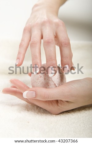 Beautiful hands with pure healthy skin and nails. perfect wet french manicure