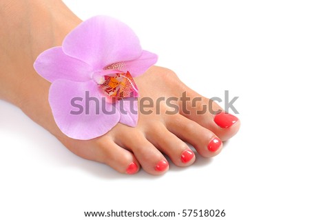 stock photo Beautiful feet leg with perfect spa pedicure on bright pink