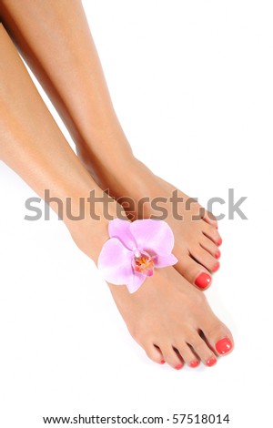 stock photo Beautiful feet leg with perfect spa pedicure on bright pink 