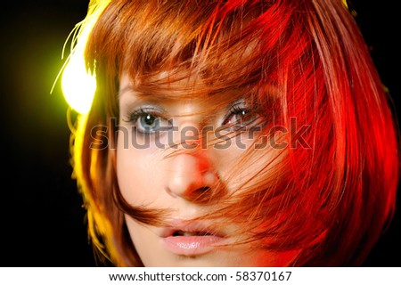 Beauty portrait of pretty woman with short fashion bob hairstyle. light effects