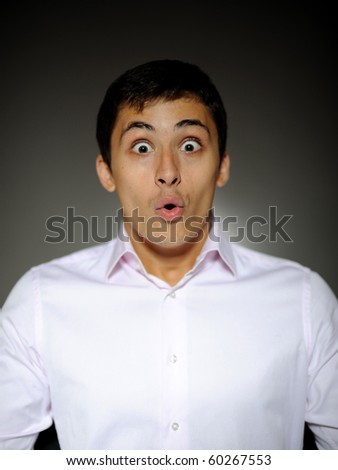 Expressions Handsome business man in white shirt  shocked