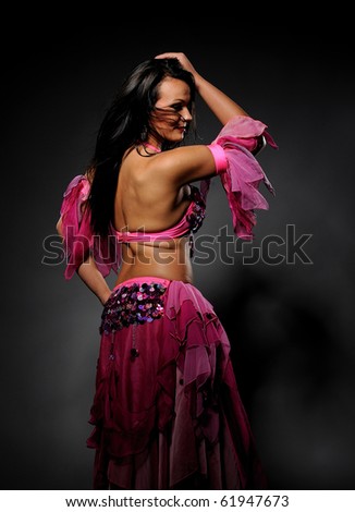 stock photo : Beautiful sexy dancer woman in bellydance costume with pretty 