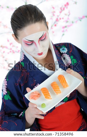 beautiful japan geisha woman with sushi roll set