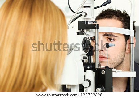 Male patient is having a medical attendance at the optometrist
