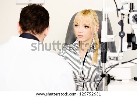 Female patient listening diagnose after medical attendance at the optometrist