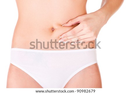 Woman pinching stomach for skin fold test, isolated on white. Health concept