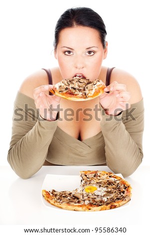 stock photo chubby woman enjoy eating a slice of pizza isolated on white