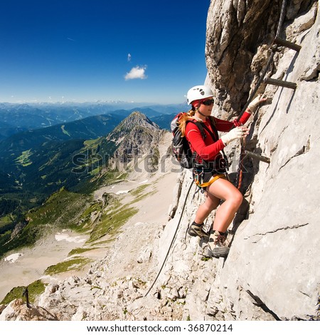 girl climbing mountains