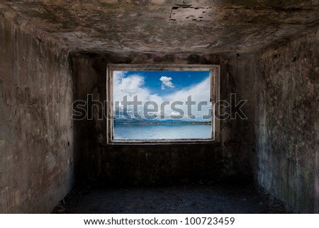 Dark old room with window with sea behind him