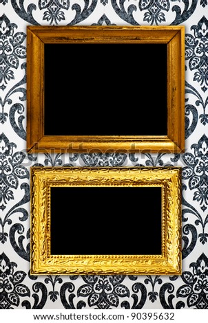 Gold frame on vintage wallpaper background