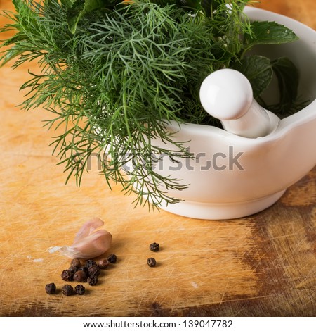 Fresh organic herbs  - mint, fennel on wooden background. Selective focus.