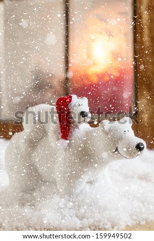 Decorative christmas composition. Holiday postcard - bears in snow against window.
