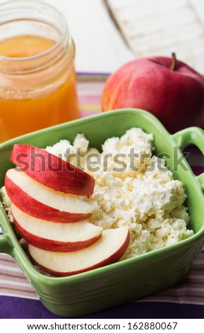 Fresh natural products - cottage cheese, apple, honey. Rustic style. Bio/organic/natural ingredients. Healthy eating.