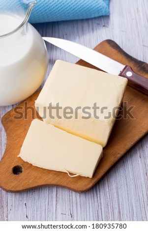 Fresh dairy products - butter, milk. Rustic style. Bio/organic/natural ingredients. Healthy eating.