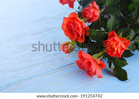 Postcard with fresh flowers and empty place  for your text. Flower background. Selective focus.