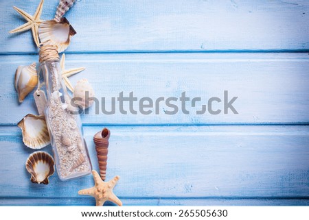 Marine items on blue painted wooden background.  Selective focus.